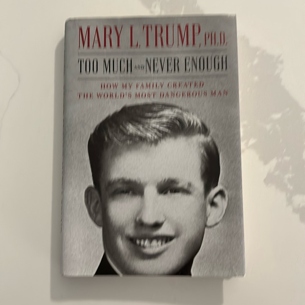 New Hardcover Book. Too Much and Never Enough